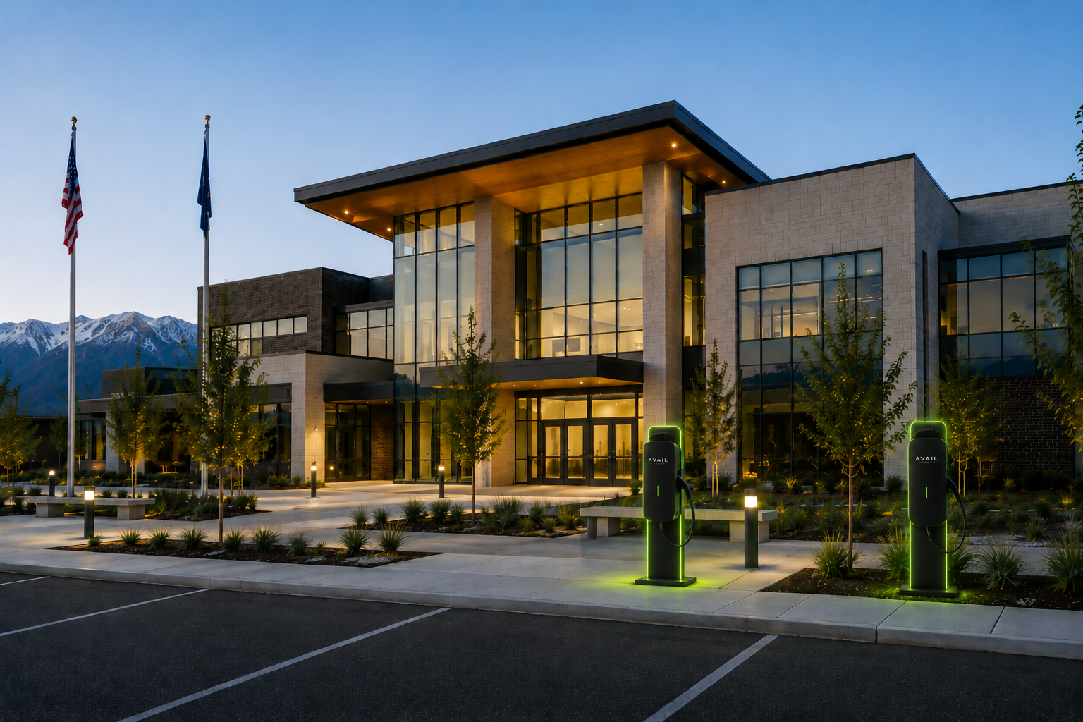 Civic building at dusk with public EV charging available.